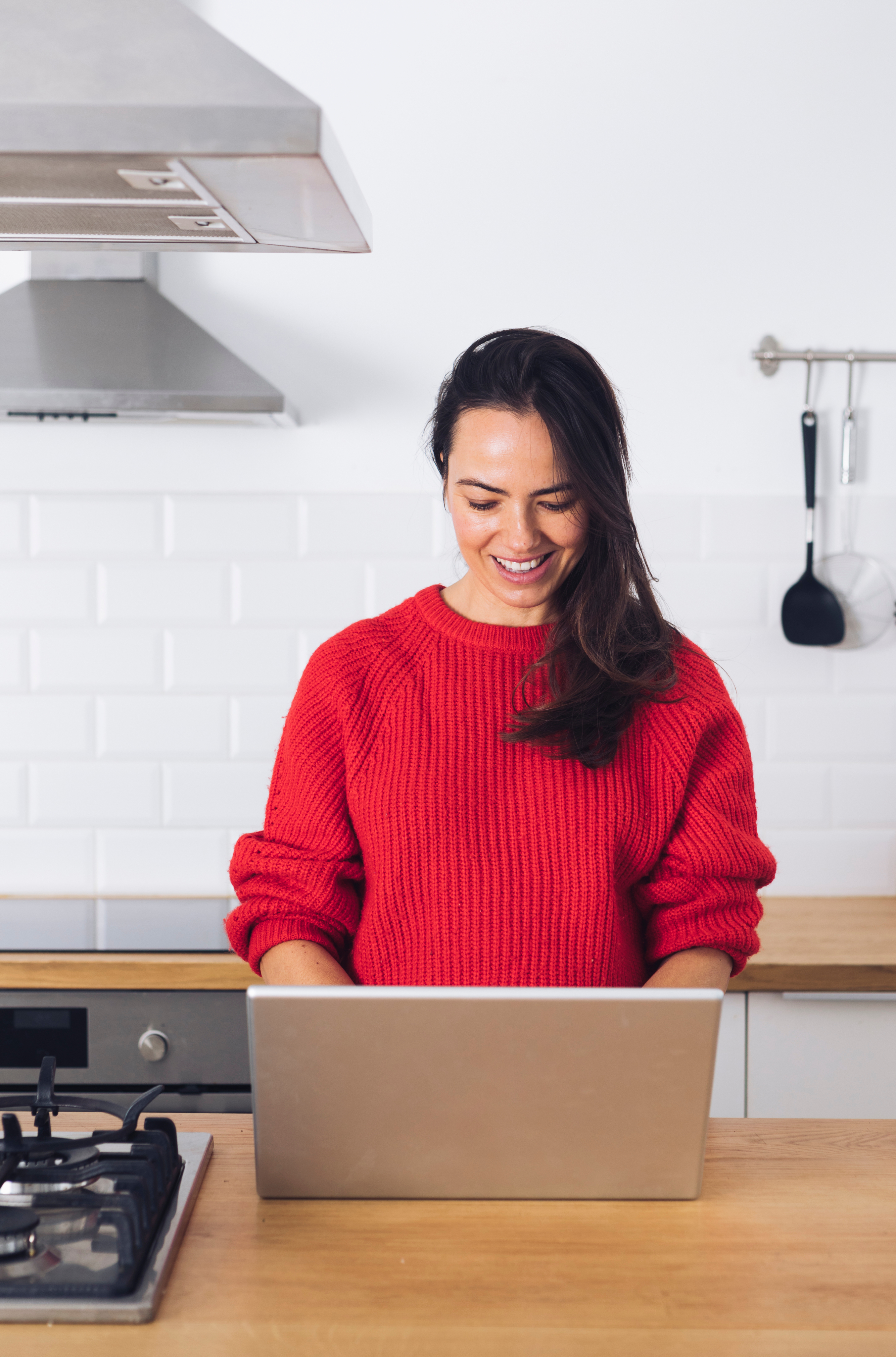 Woman working at a computer on the counter